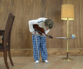 拿着小提琴的男孩在鞠躬图片素材