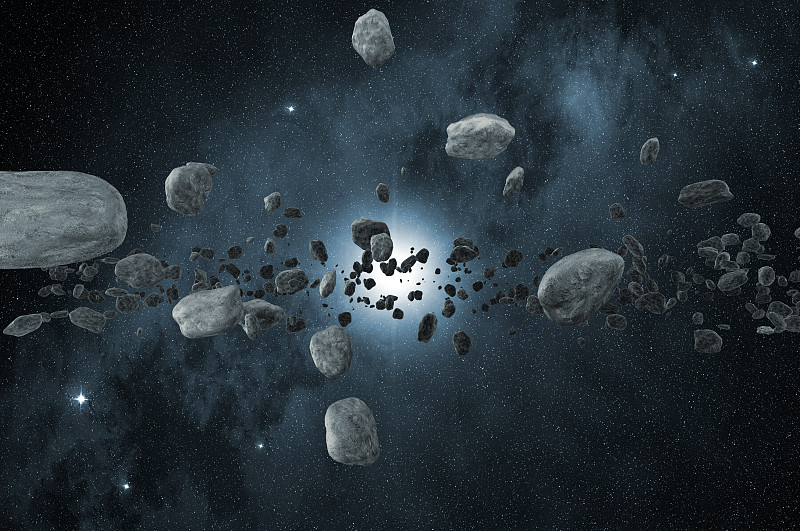 一群散落在太空中的小行星圖片素材
