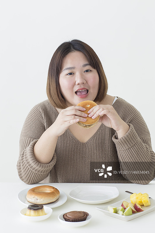 女性,肥胖,饮食过量图片素材