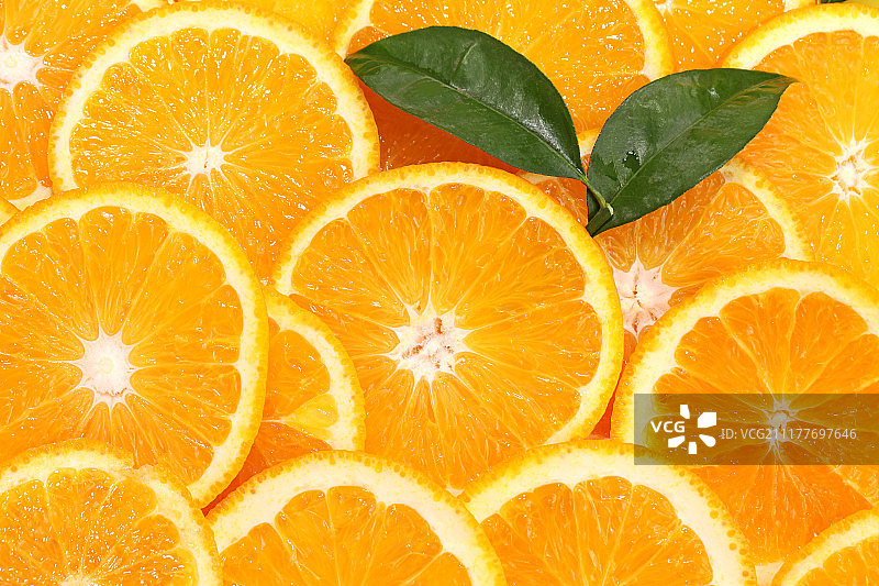切片橙子与绿叶图片素材