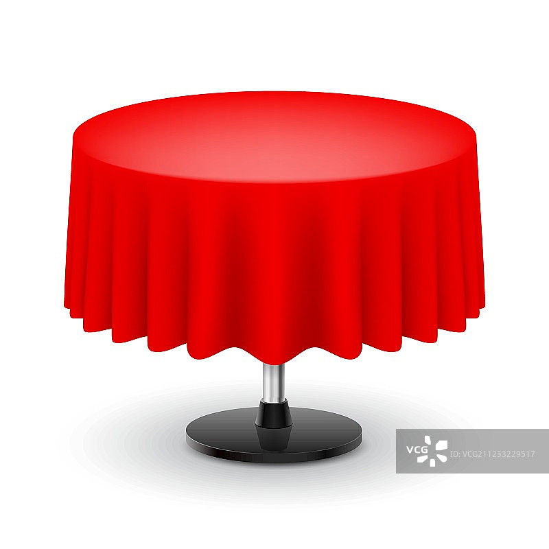 红色桌布的圆桌。图片素材