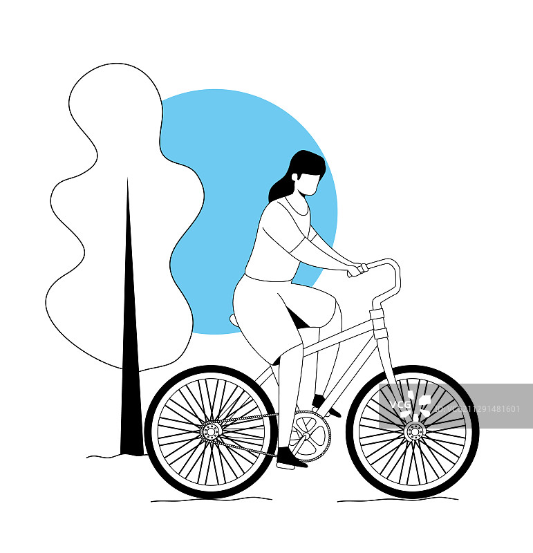 在公园里骑自行车的女人图片素材