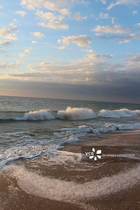 日落时的海天景色，贝瑟尼海滩，特拉华，美国，美国图片素材