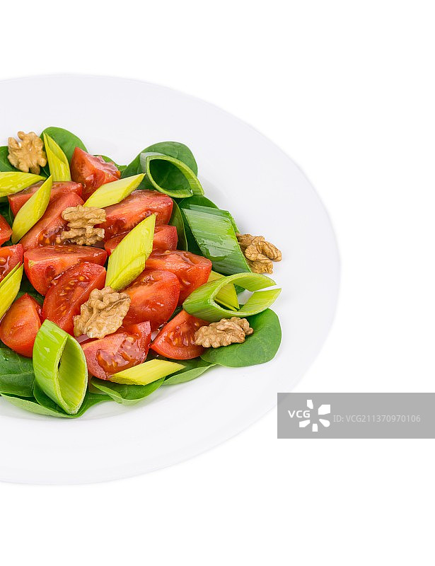 健康沙拉的特写，白色背景下盘子里食物的特写，摩尔多瓦图片素材