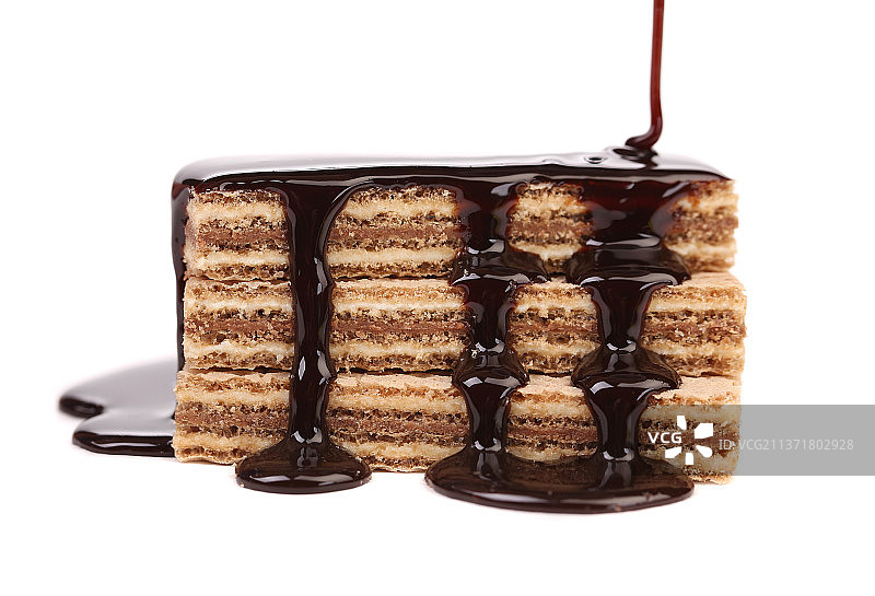 涂有巧克力的木桩威化饼，白色背景下的巧克力蛋糕特写，摩尔多瓦图片素材