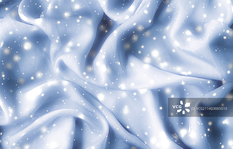 神奇的假日蓝色软丝平坦的背景纹理与发光图片素材