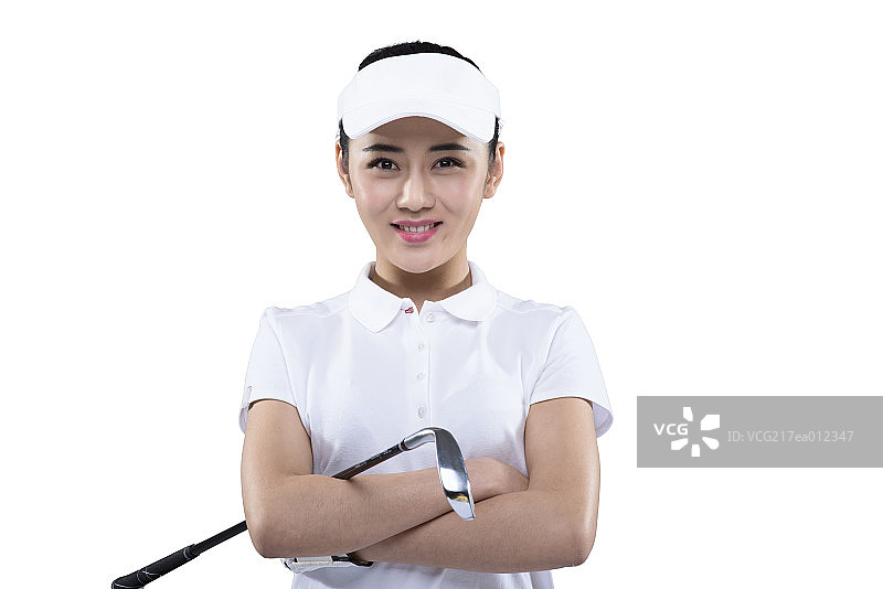 Portrait of a young female golfer图片素材
