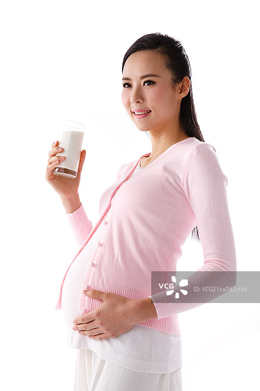 孕妇手拿牛奶杯图片素材