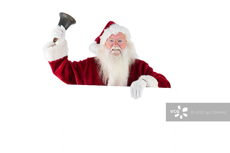 圣诞老人举着一个标志，在白色背景上摇铃图片素材