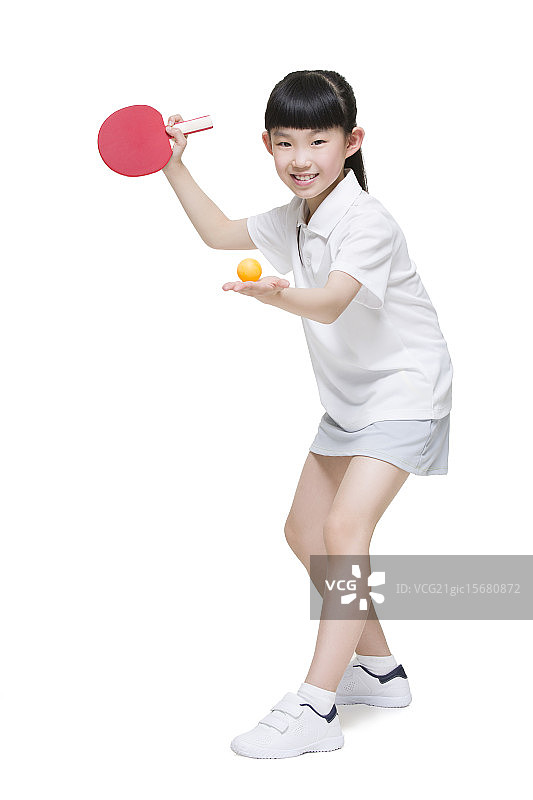 可爱的小女孩打乒乓球图片素材