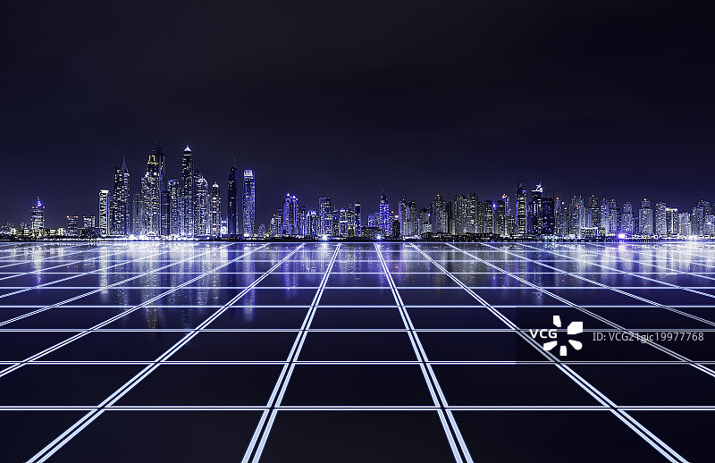 科技感地面和迪拜摩天大楼繁华夜景图片素材