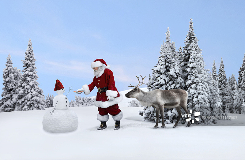 圣诞老人给雪人一个鼻子图片素材