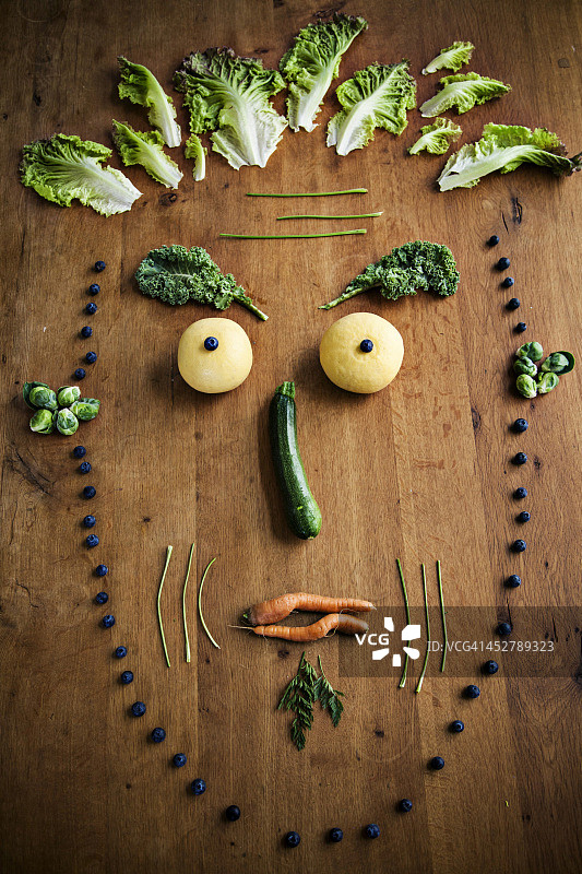 由蔬菜和水果制成的面部插图图片素材