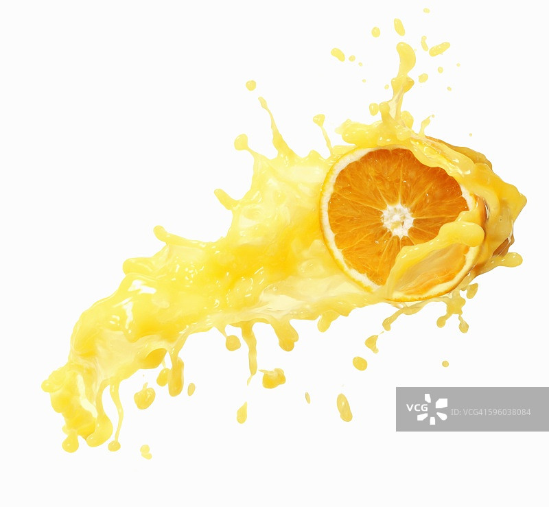 半个橙子，淋上橙汁图片素材