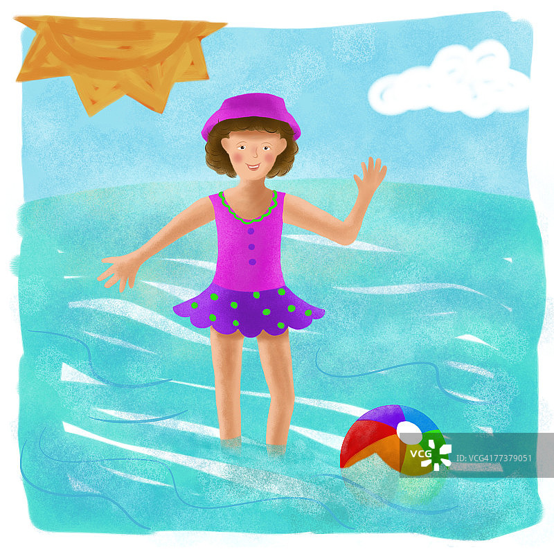 一个小女孩在海滩上享受一天图片素材
