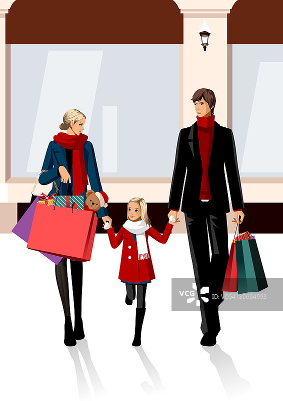 一对夫妇提着购物袋，带着他们的女儿散步图片素材