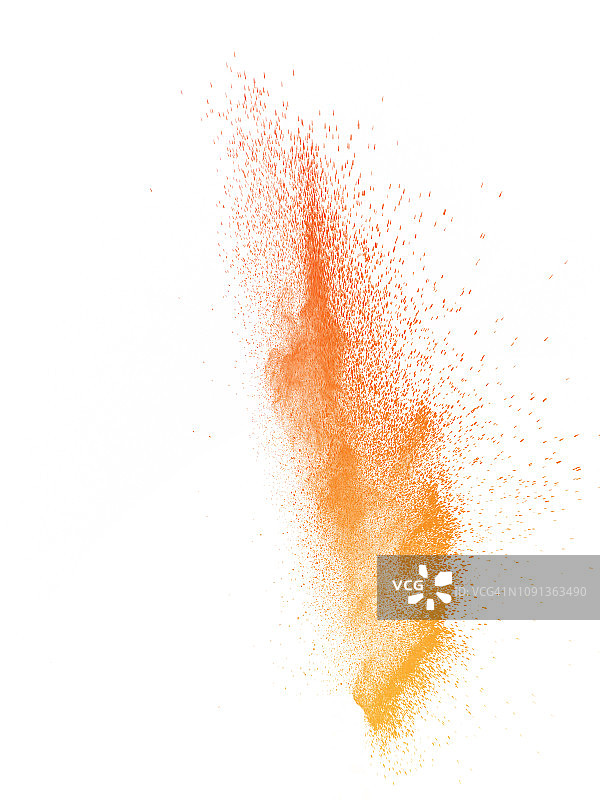 爆炸是由一团橙色粉末颗粒在白色背景上的撞击造成的。图片素材
