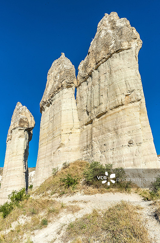 土耳其，戈雷米国家公园和卡帕多西亚的岩石遗址，爱谷(或白谷)的凝灰岩锥和阴茎形状的hoodoos(联合国教科文组织世界遗产)图片素材