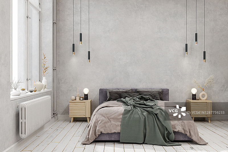 卧室内部与绿色毯子在床上，吊灯，拼花地板和灰色墙壁背景图片素材