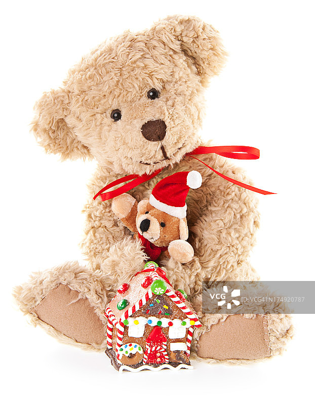 圣诞礼物泰迪熊和姜饼屋图片素材