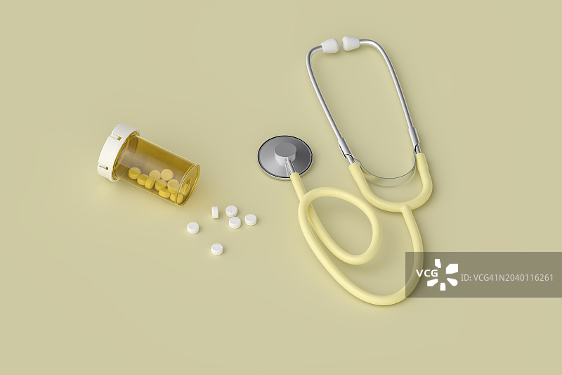 听诊器和处方瓶里的药片图片素材