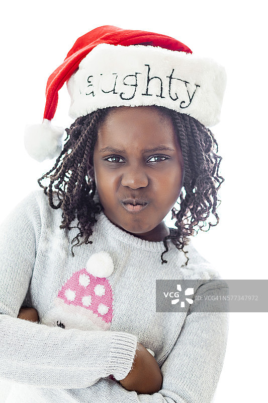 圣诞节期间淘气的小女孩图片素材