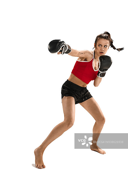 适合美丽的女人与拳击手套隔离在白色的背景图片素材