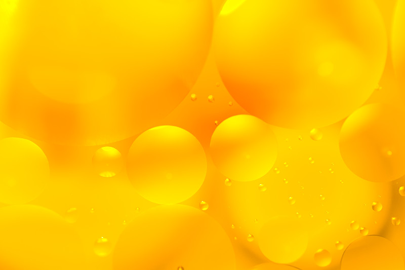 油和水黄色的气泡和水滴图片下载