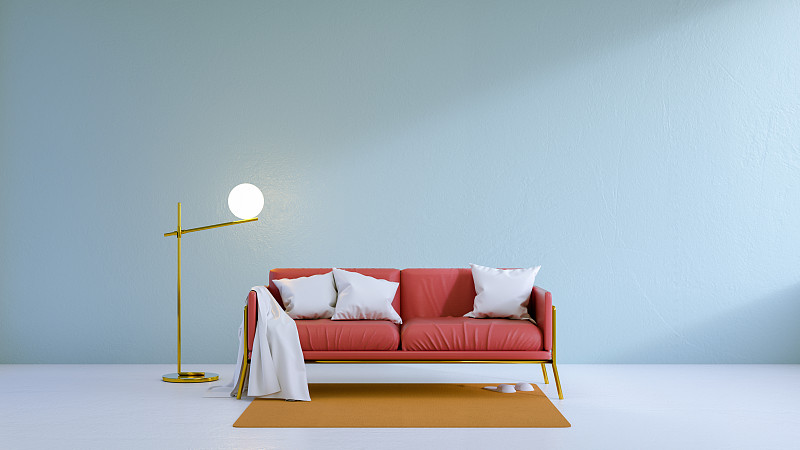简约的客厅，白色地板上的红色沙发和蓝色的墙壁。三维渲染图片下载