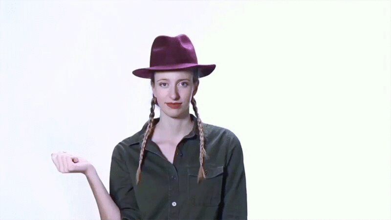 年轻成年女子在换帽子时打响指插画下载