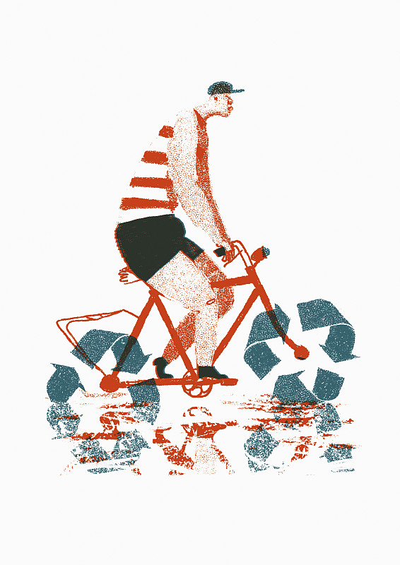 男人骑着有回收标志轮子的自行车图片下载