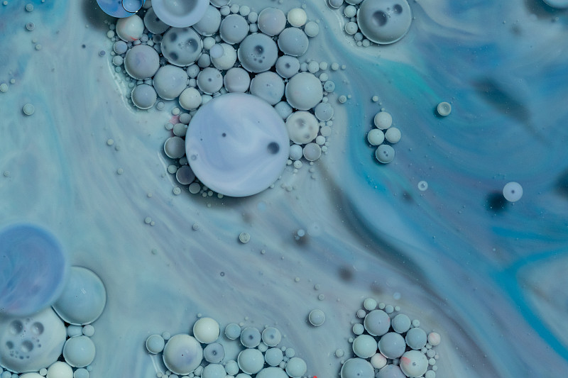 液体颜色背景。抽象丙烯酸彩色气泡背景。流体艺术。图片素材