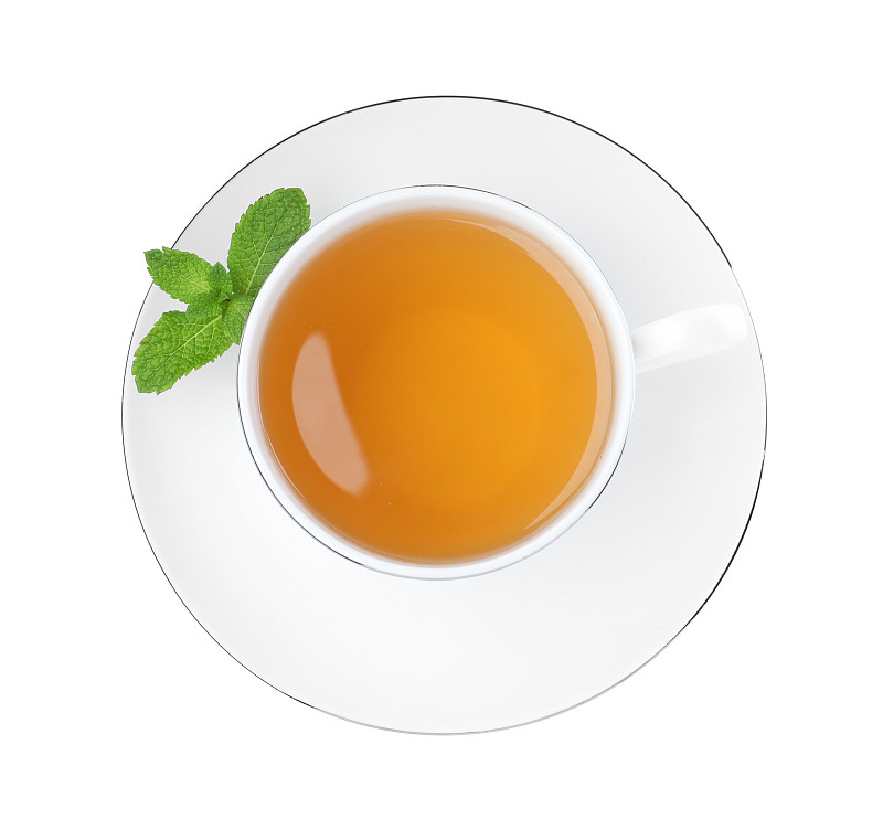 一杯芳香的绿茶和新鲜的薄荷在白色的背景，俯瞰图片下载