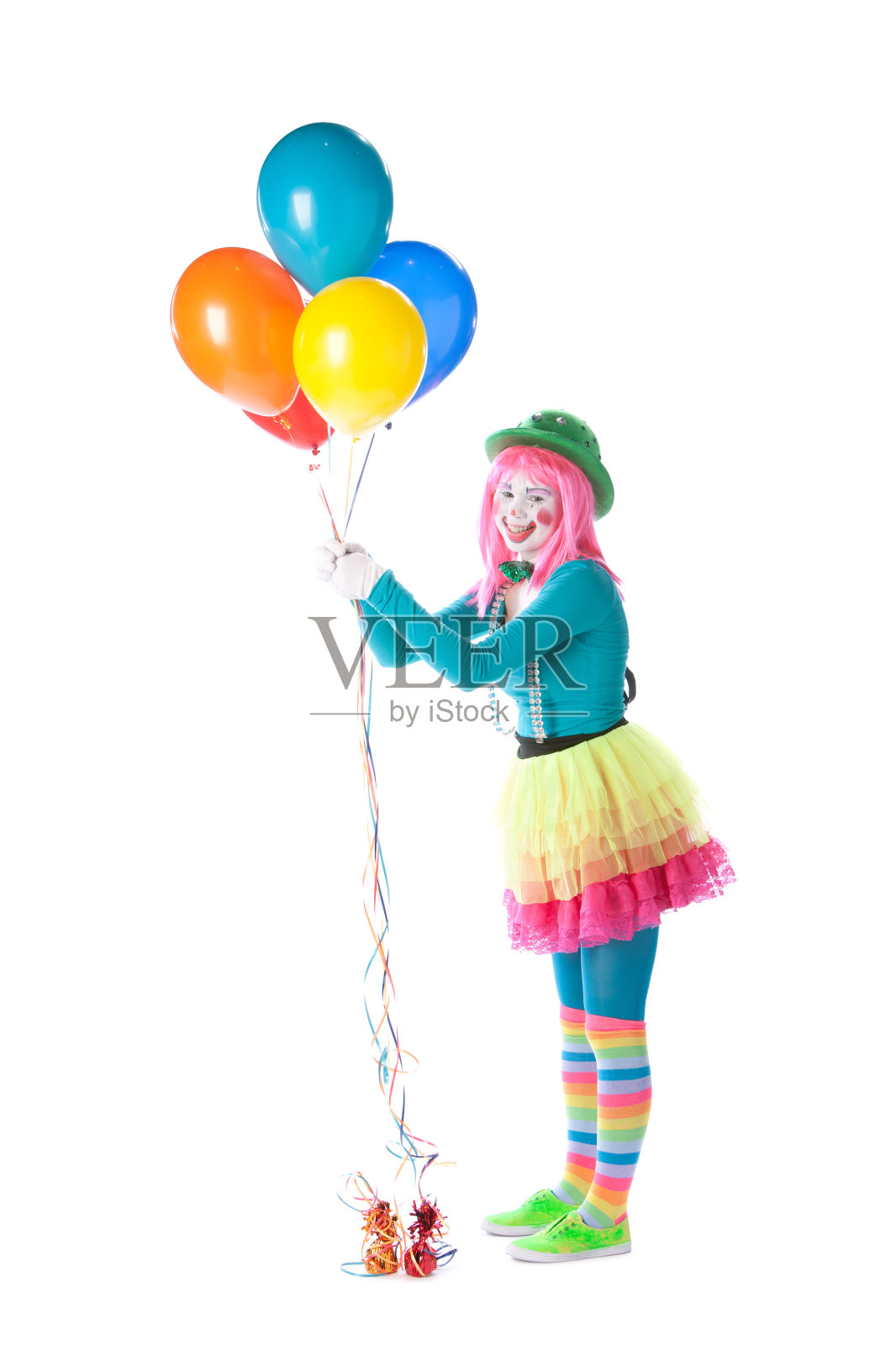 小丑:年轻少女的哑剧手拿彩色气球照片摄影图片