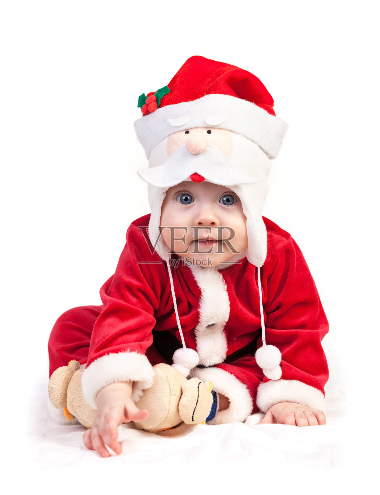 穿圣诞老人服装的可爱小男孩照片摄影图片