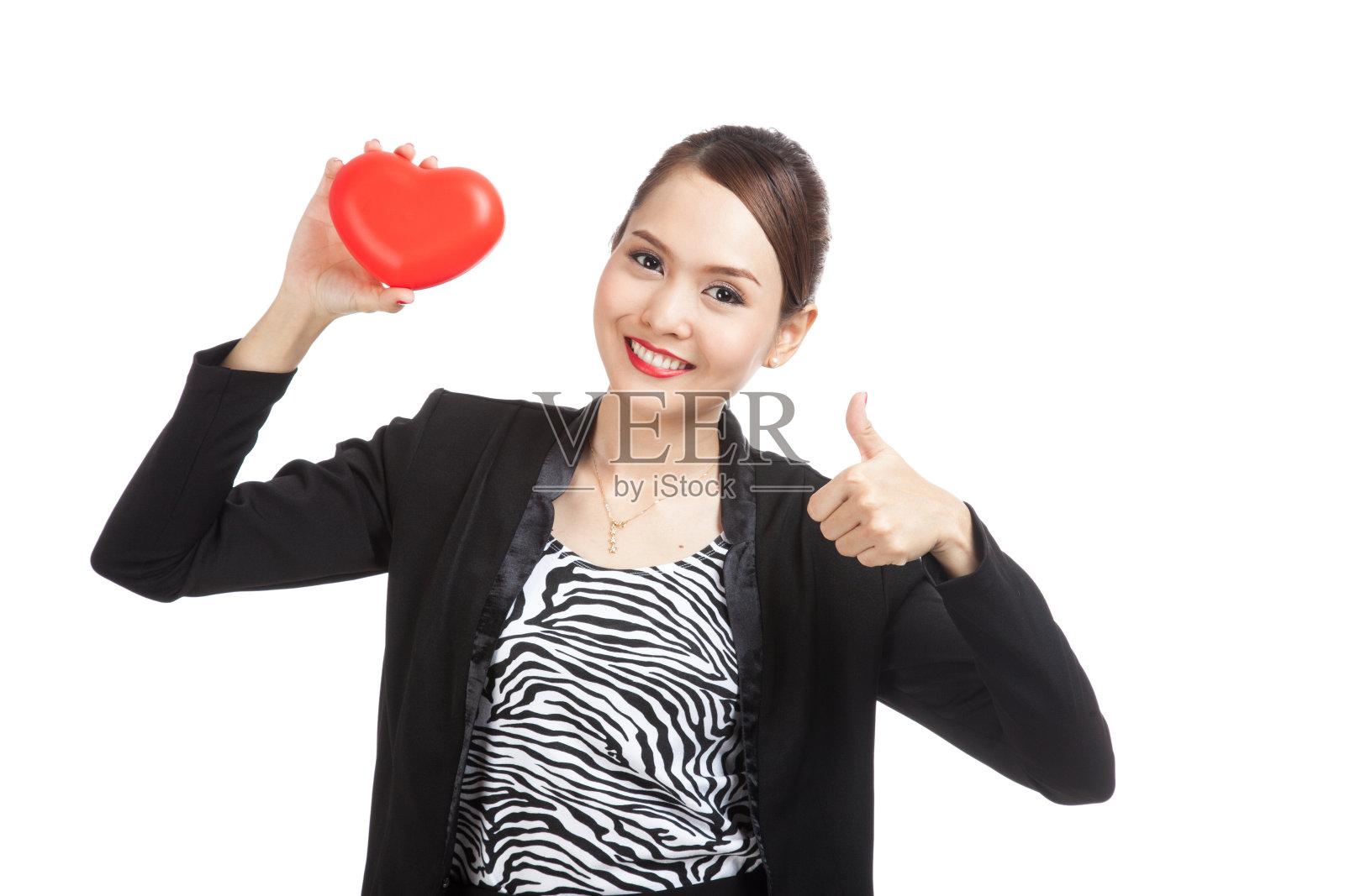 亚洲商业女性竖起大拇指，红心照片摄影图片
