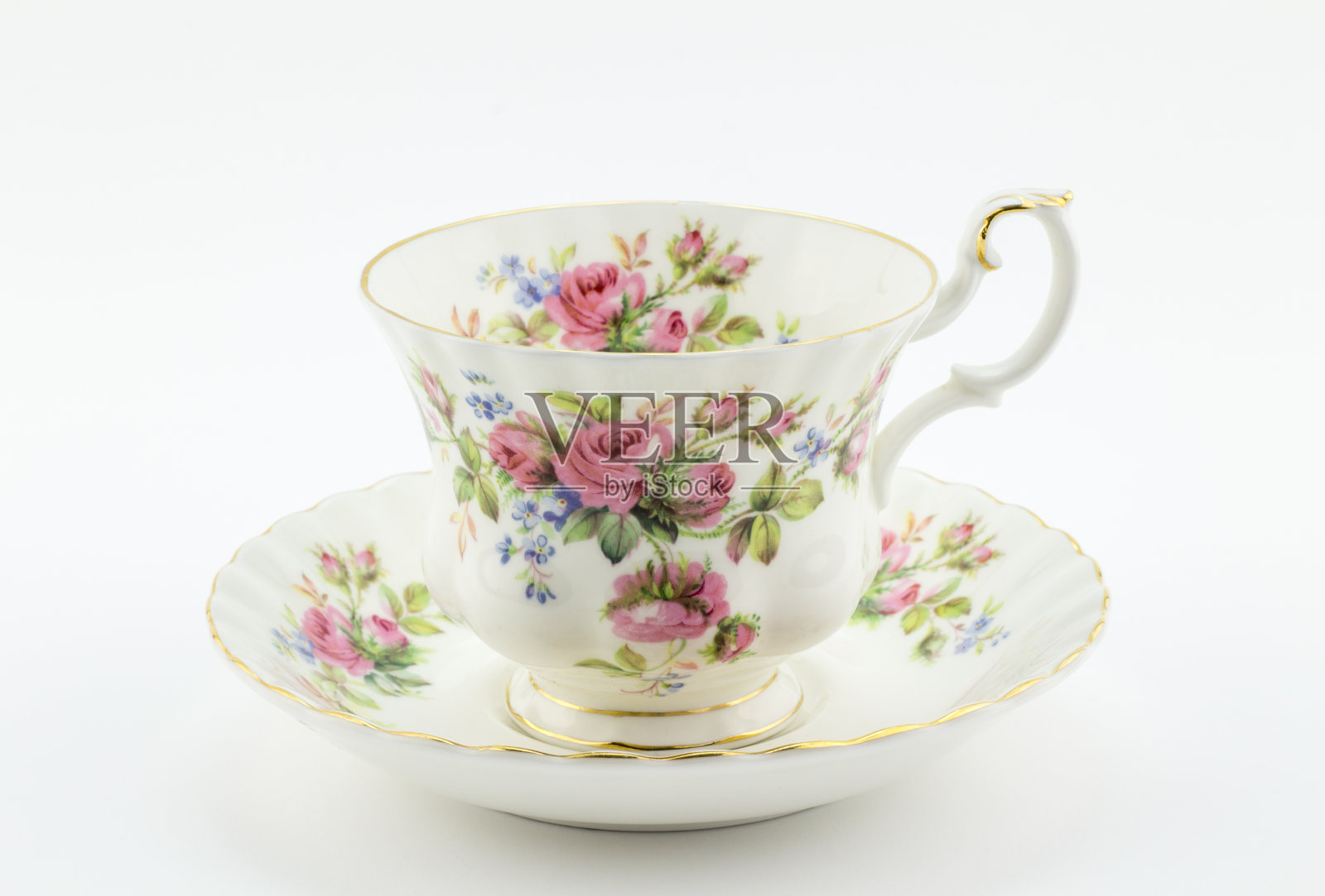 空的古董杯和碟与玫瑰装饰孤立在白色的英国茶照片摄影图片