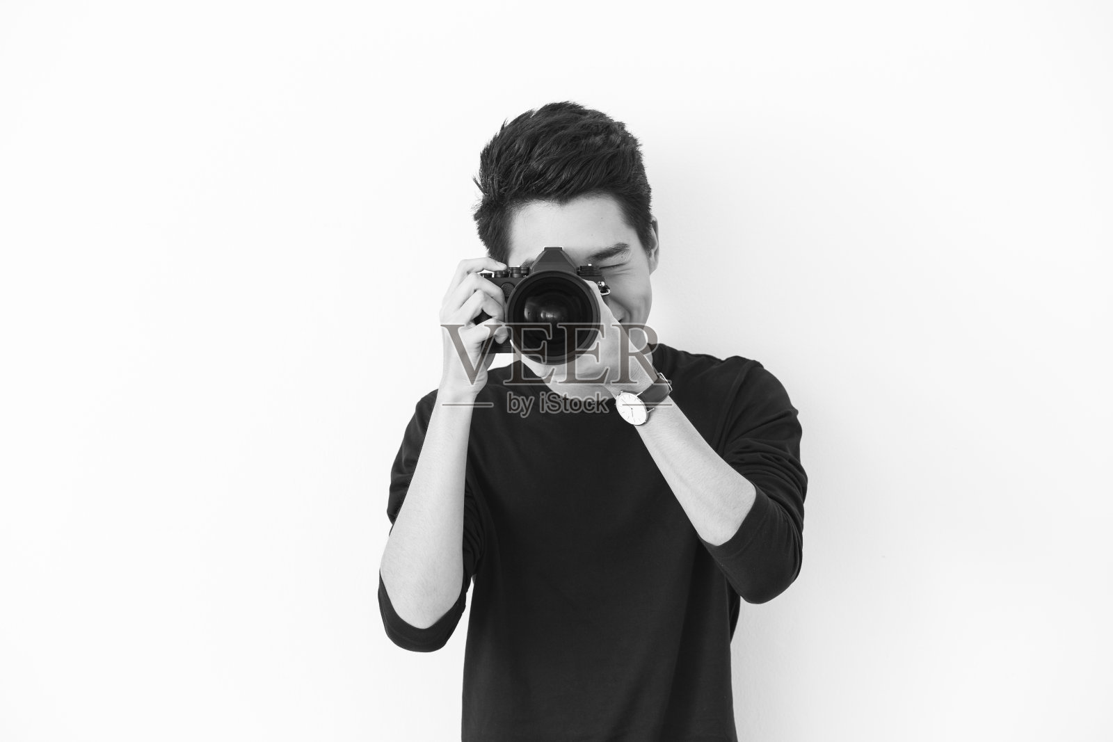 年轻的亚洲摄影师照片摄影图片