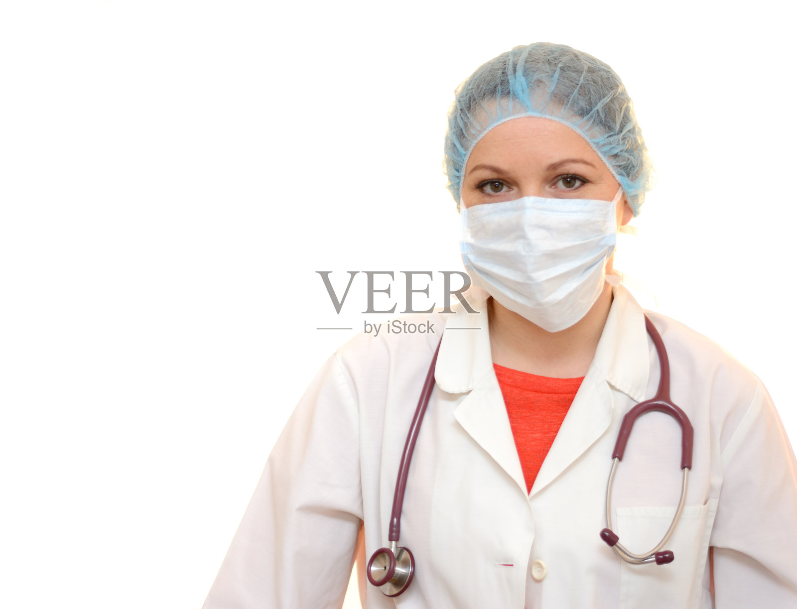 医生与外科口罩，帽和听诊器照片摄影图片
