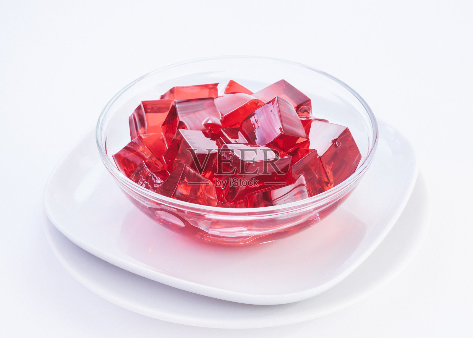 玻璃碗里的红色果冻照片摄影图片
