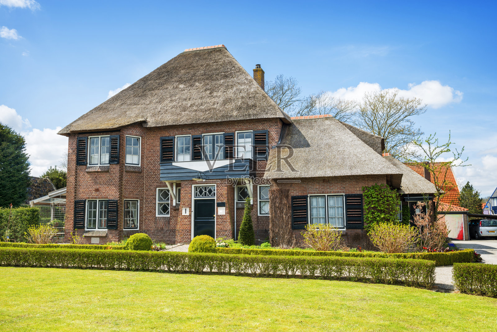 美丽的荷兰风景与一个古老的传统房子照片摄影图片