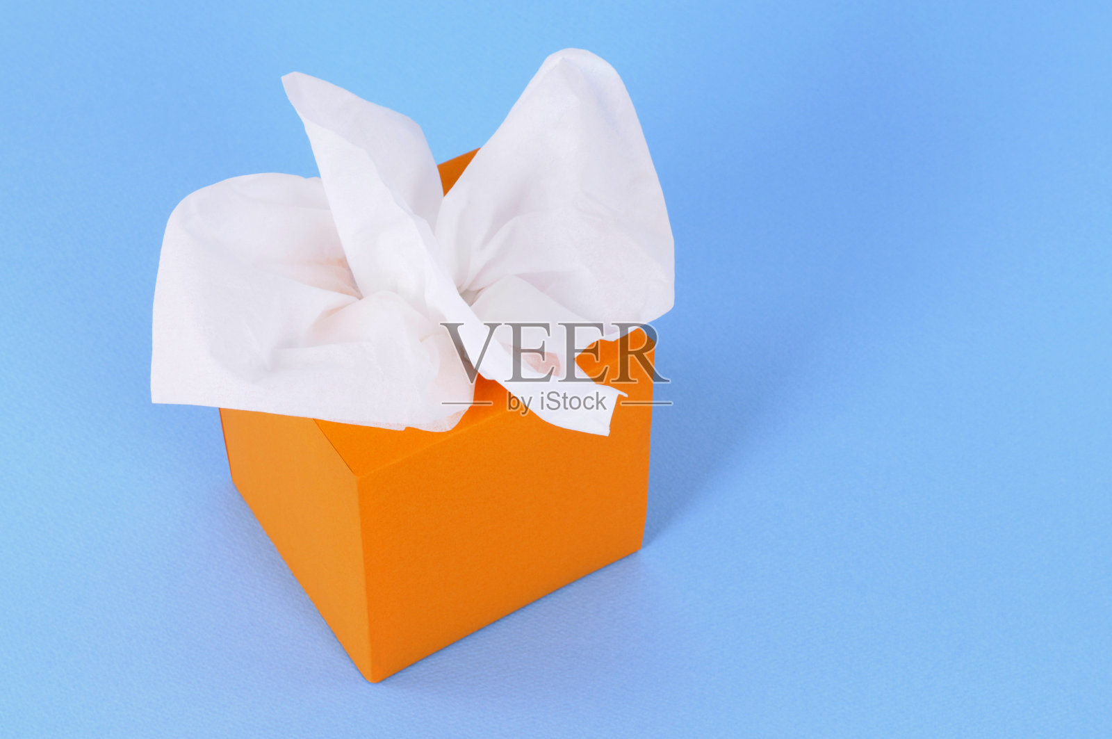橙色的纸巾盒照片摄影图片