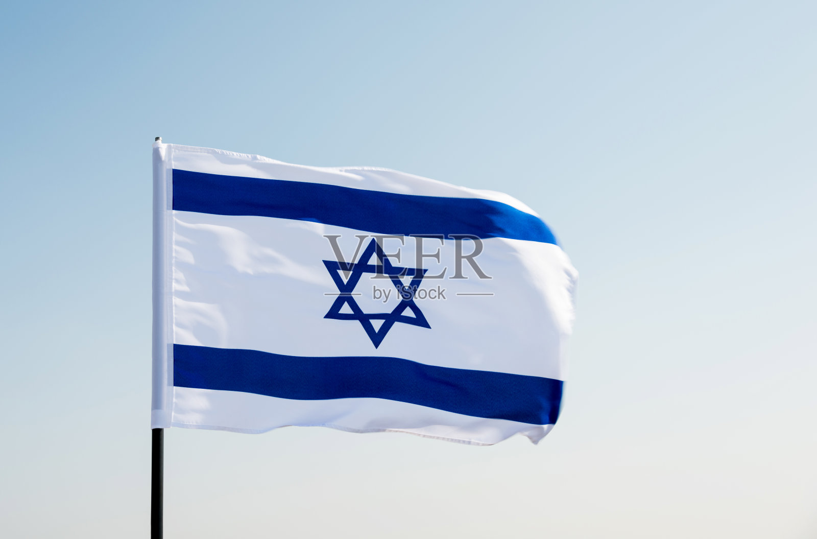 以色列的国旗在风中飘扬照片摄影图片