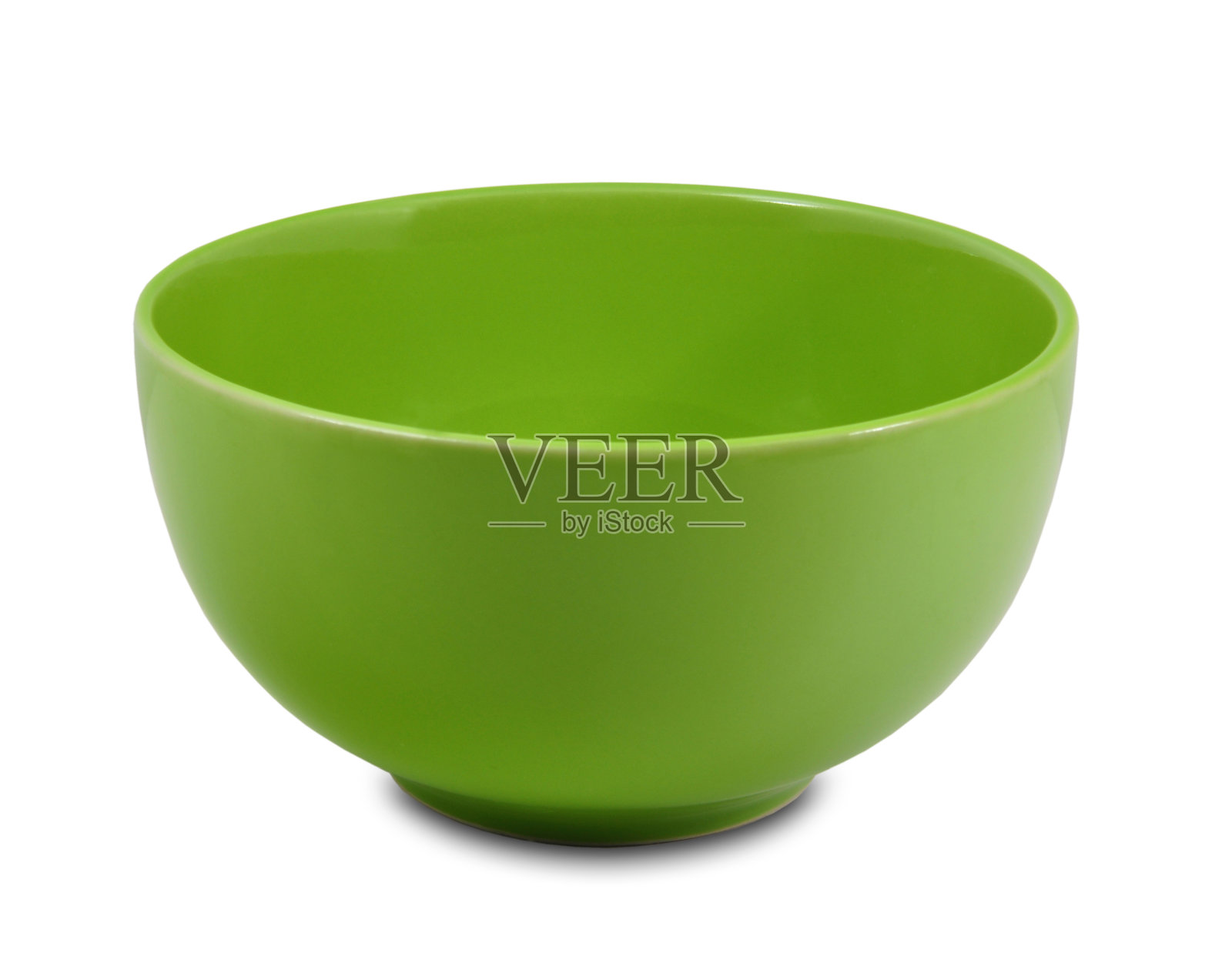 白色背景上的绿色陶瓷碗照片摄影图片