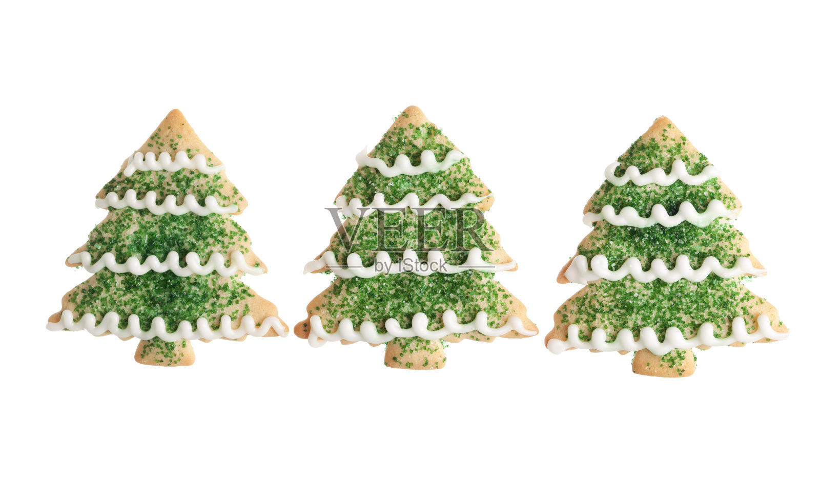 绿色的圣诞树饼干在白色的背景照片摄影图片