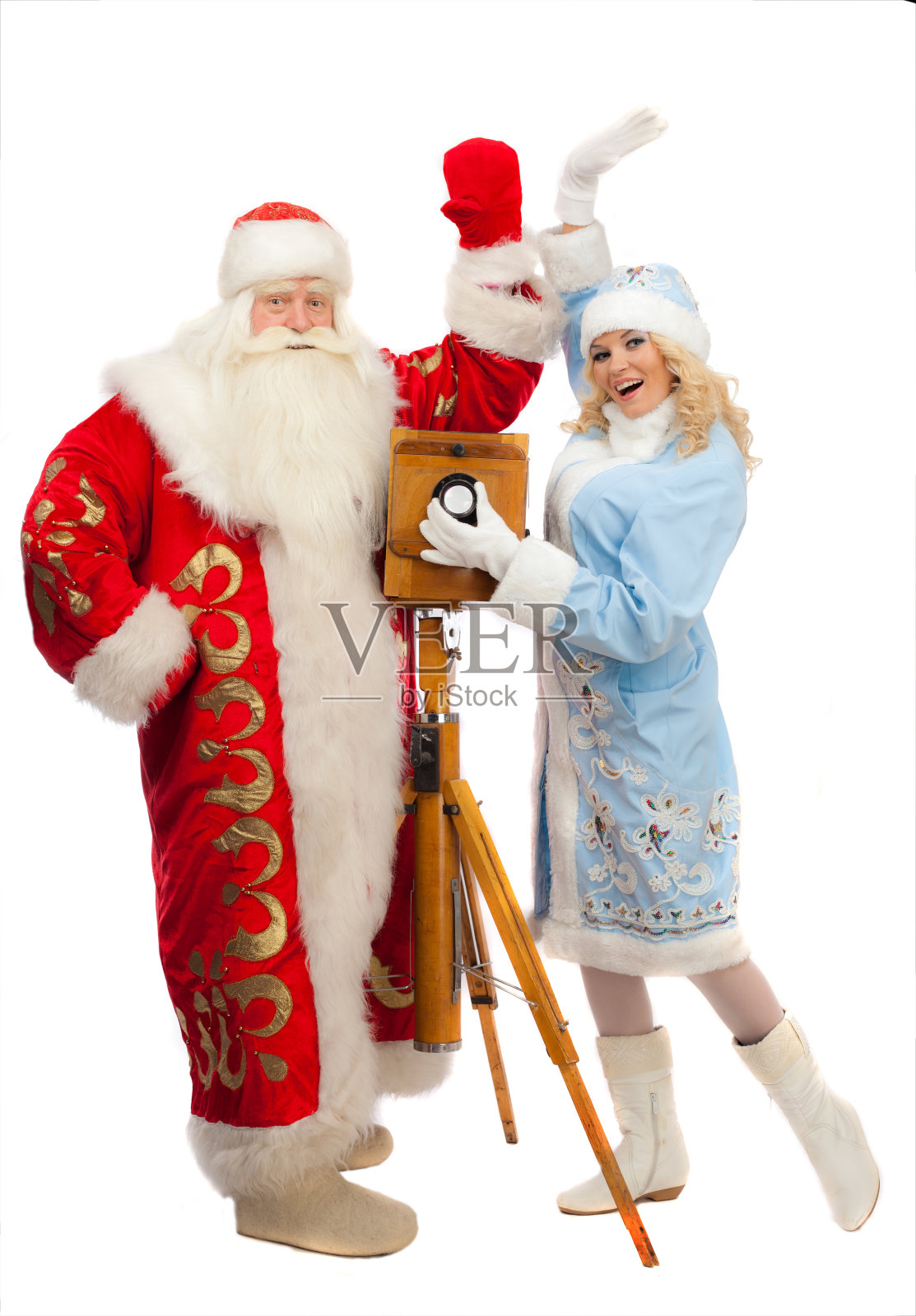 圣诞老人和雪姑娘照片摄影图片