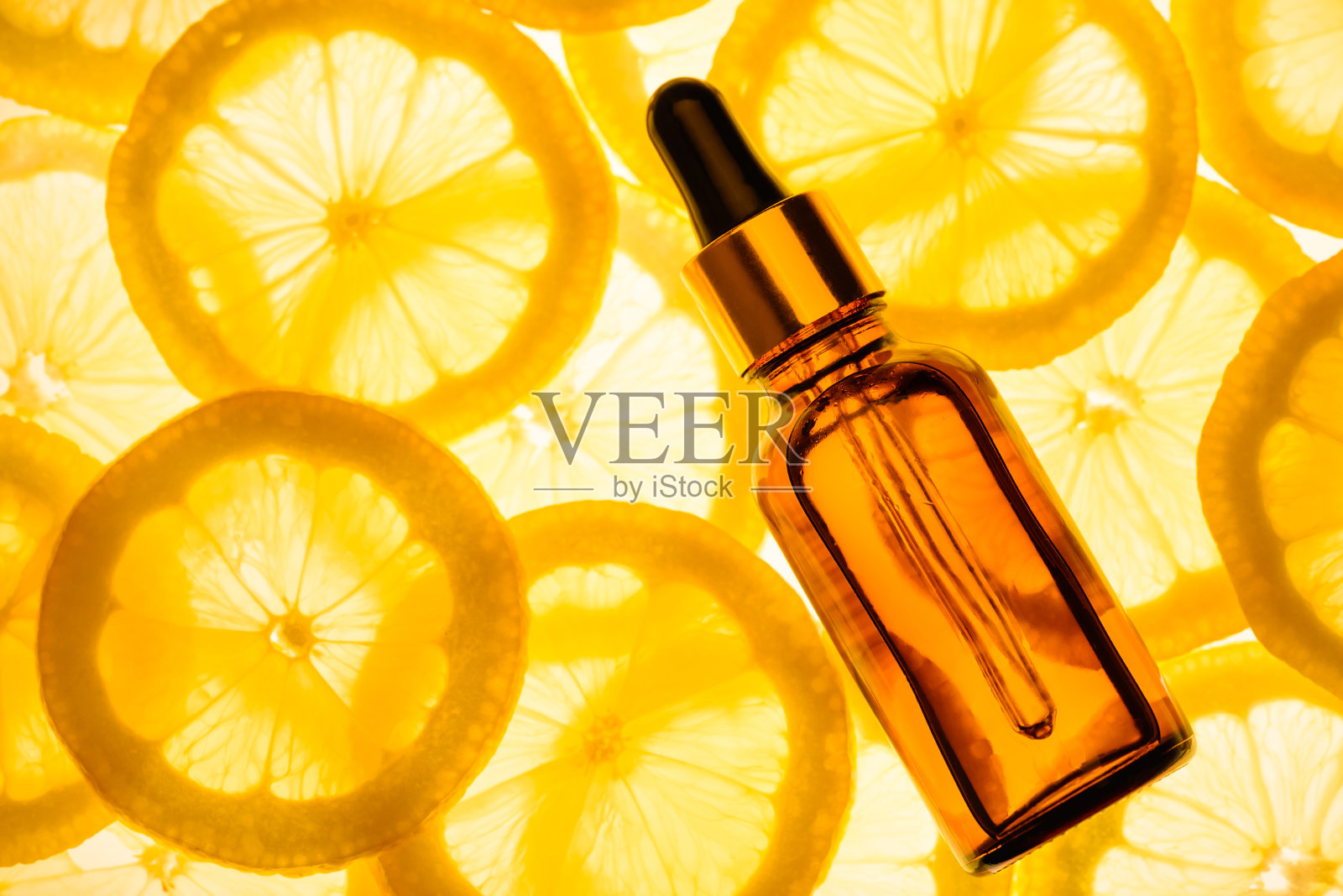 柑橘精油、维生素c精华液、美容芳香疗法。照片摄影图片