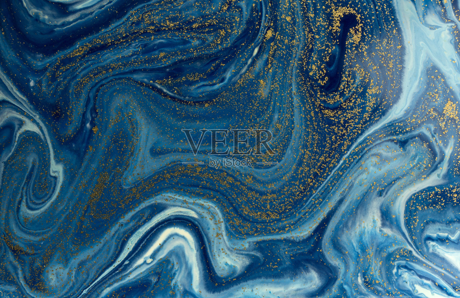 大理石蓝色和金色抽象背景。液体大理石模式照片摄影图片