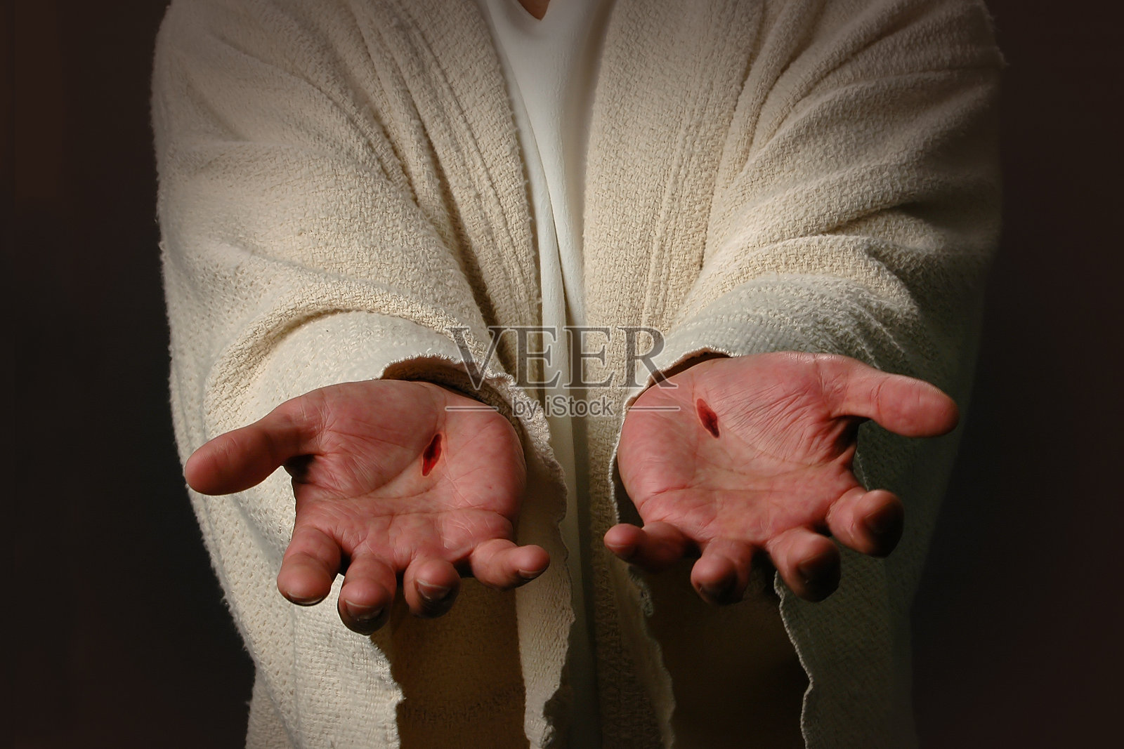 两只割破的手代表耶稣照片摄影图片