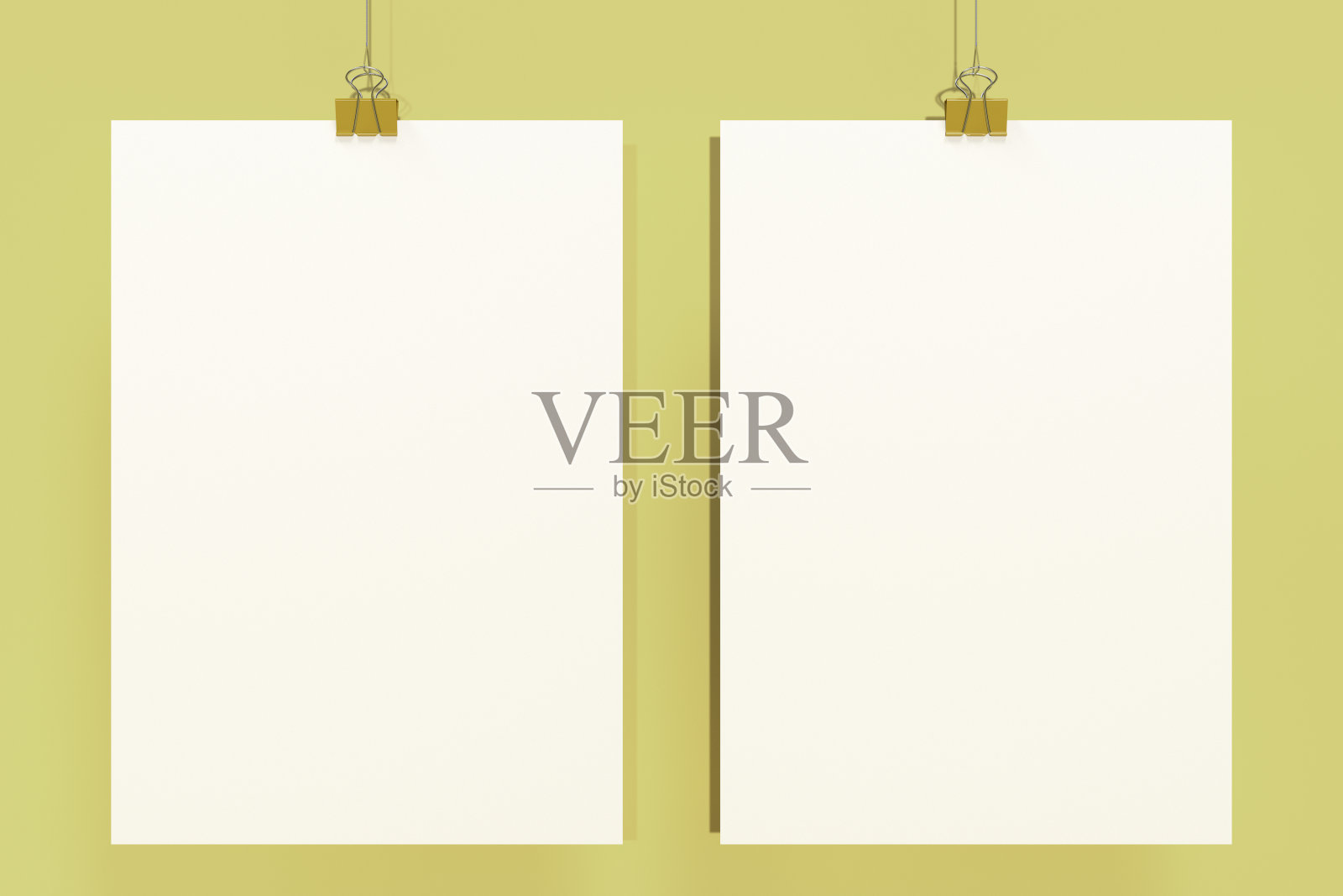 两个空白的白色海报与活页夹模型在黄色的背景照片摄影图片